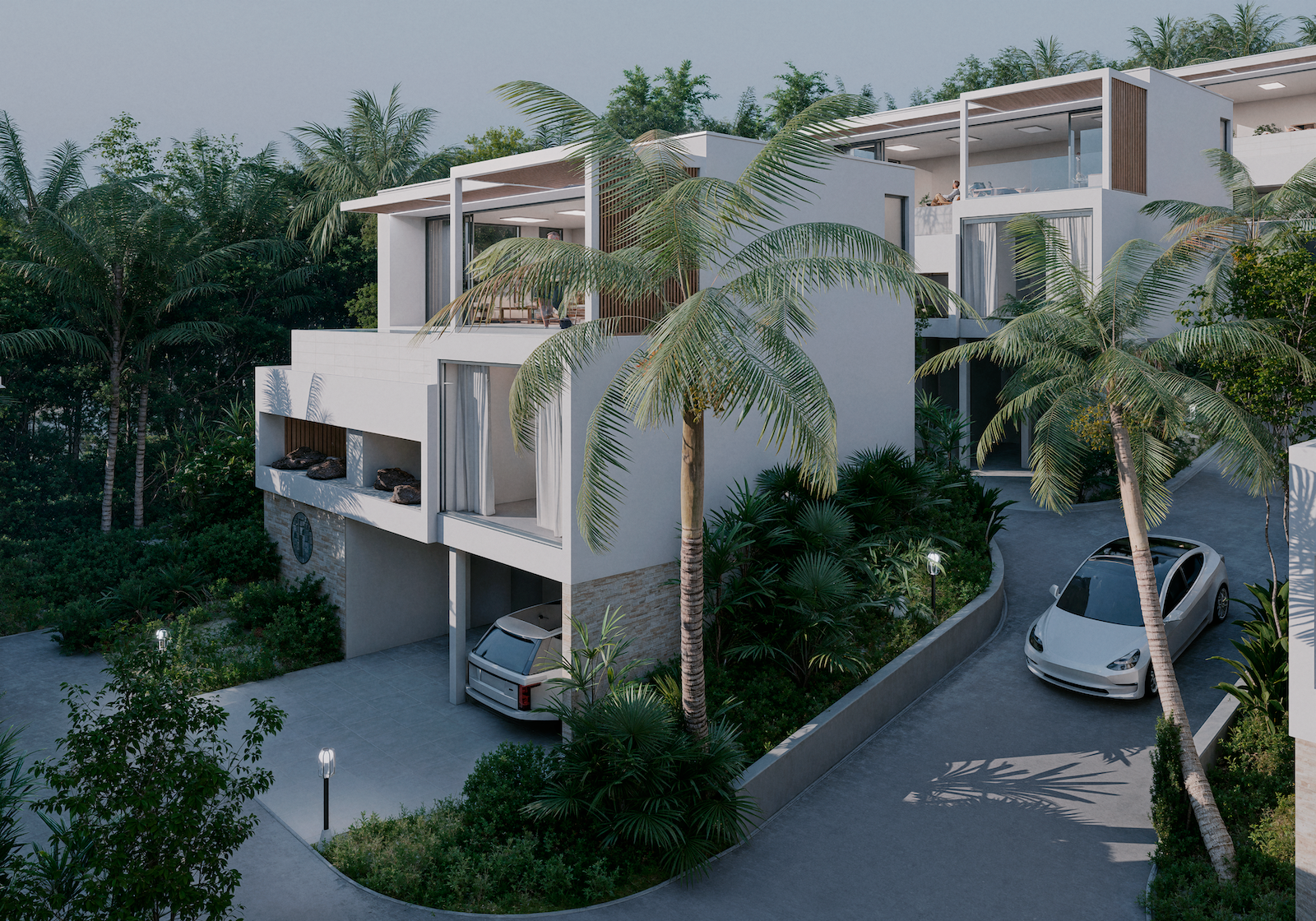 IO Villas — aerial view with pool terraces and palm trees