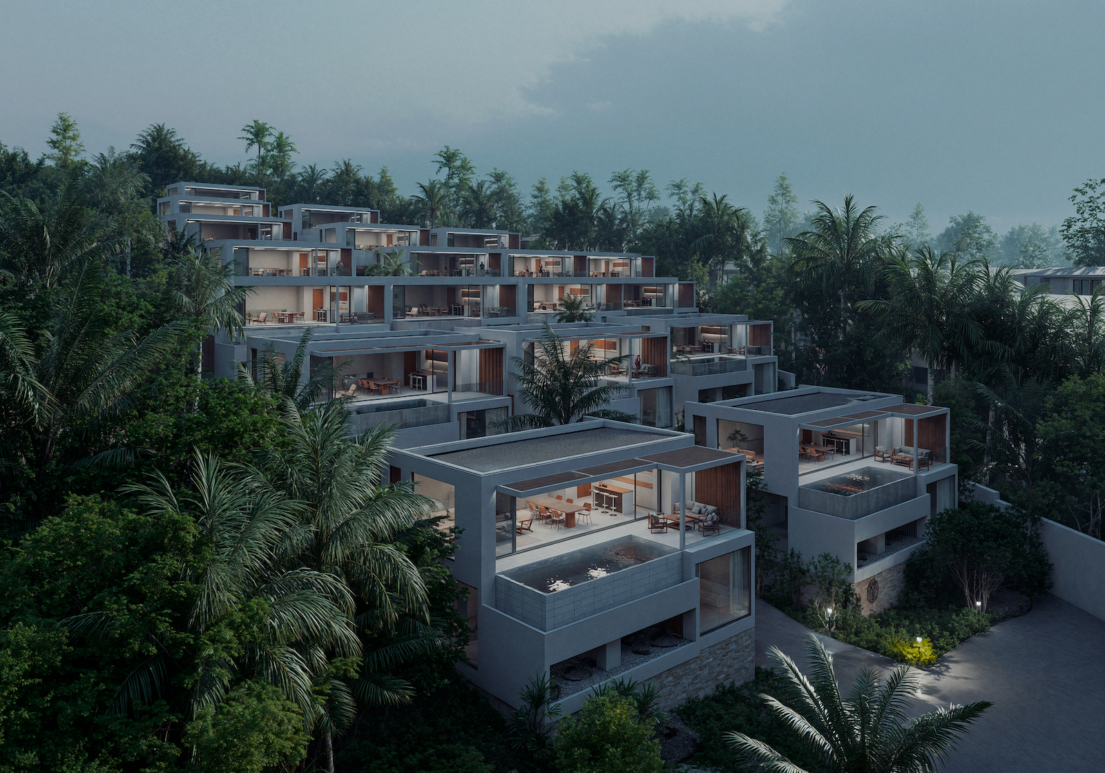 IO Villas — illuminated villas at night from above