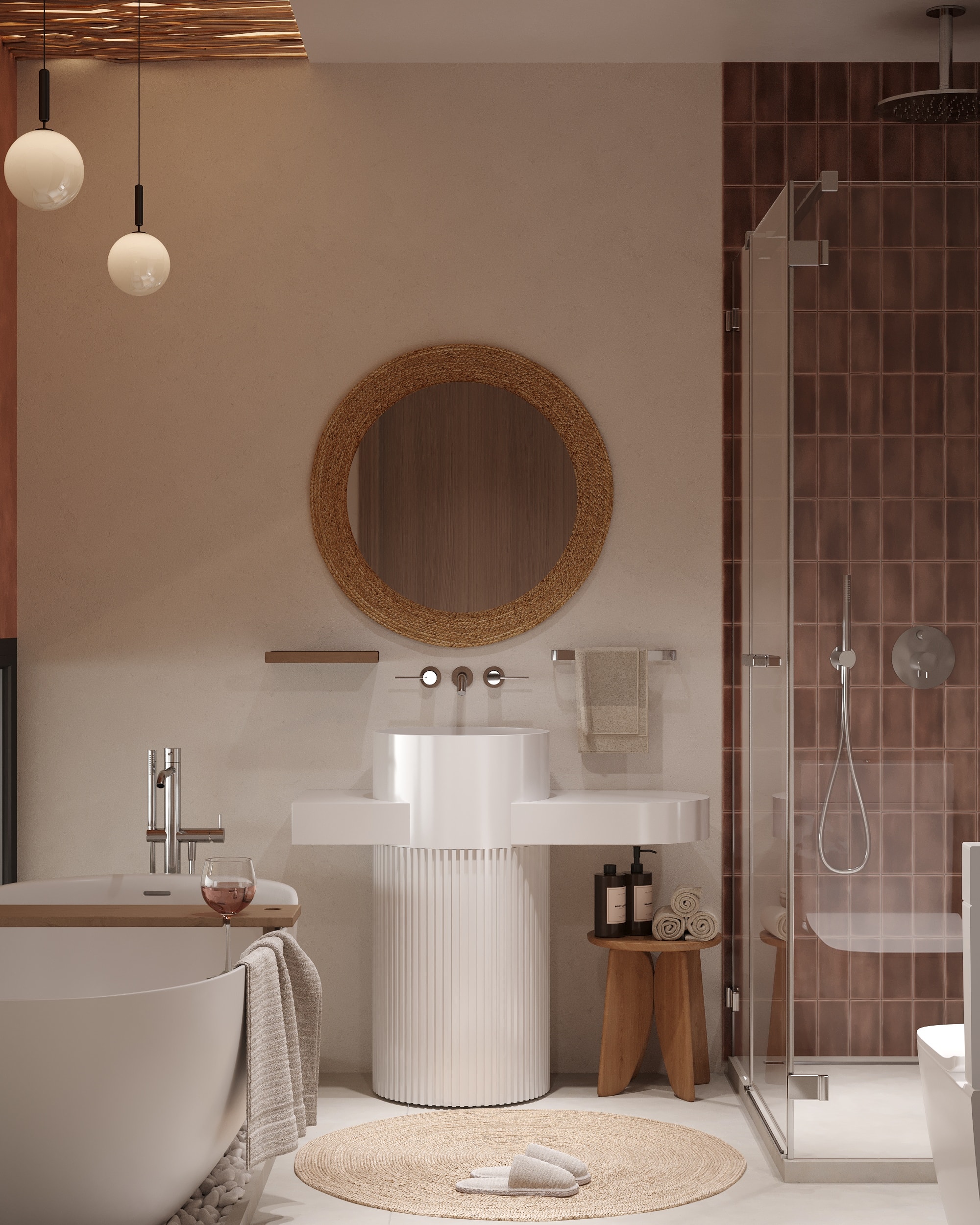 IO Villas — Bathroom 1: pedestal sink with woven mirror, freestanding bath and terracotta tile shower