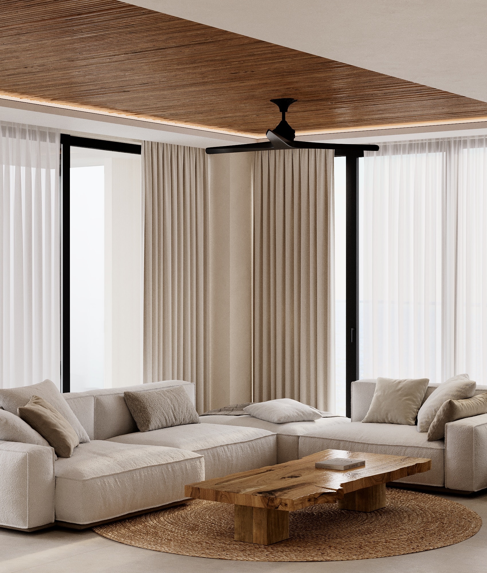 IO Villas — bright living room with wood ceiling and sectional sofa